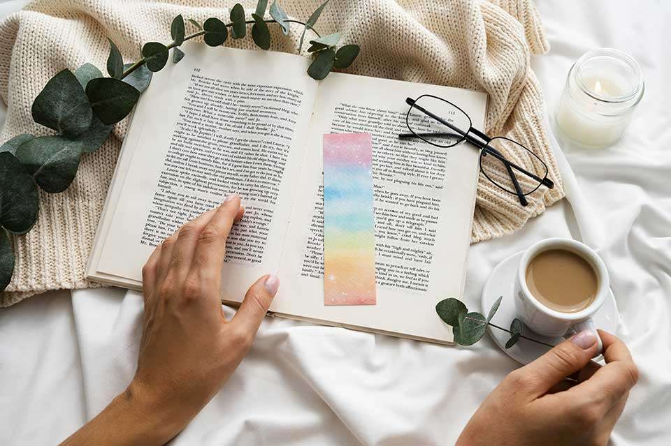 Hybrid publishing AUTHOR CENTRIC image of woman reading and drinking coffee